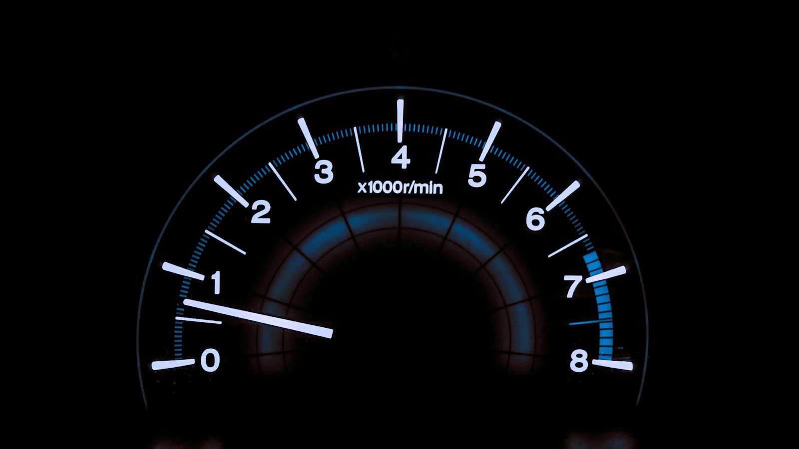 Illuminated tachometer showing engine RPM, the gauge that jumps without the car speeding up when a transmission slips