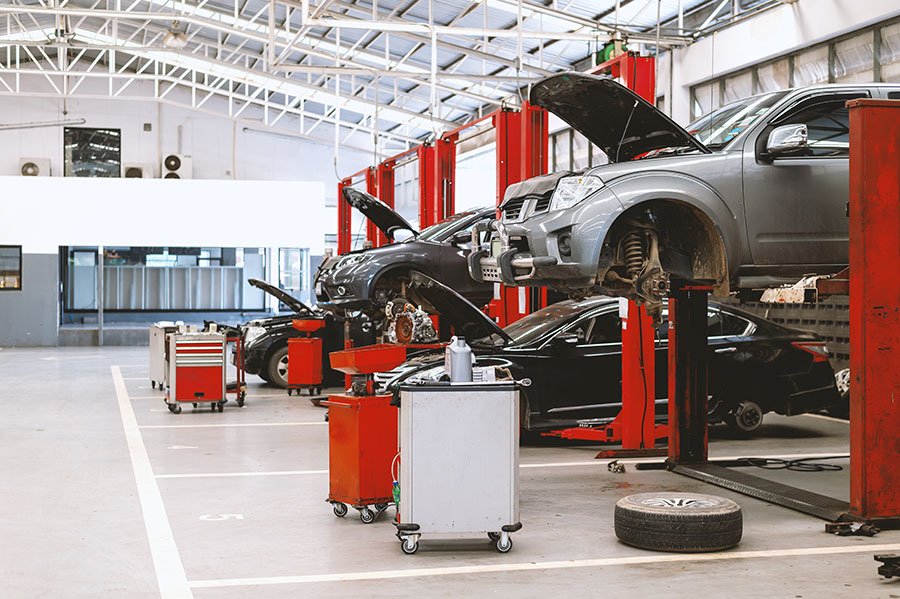 Catalytic converter inspection on a vehicle lift at Vorenza Auto Repair